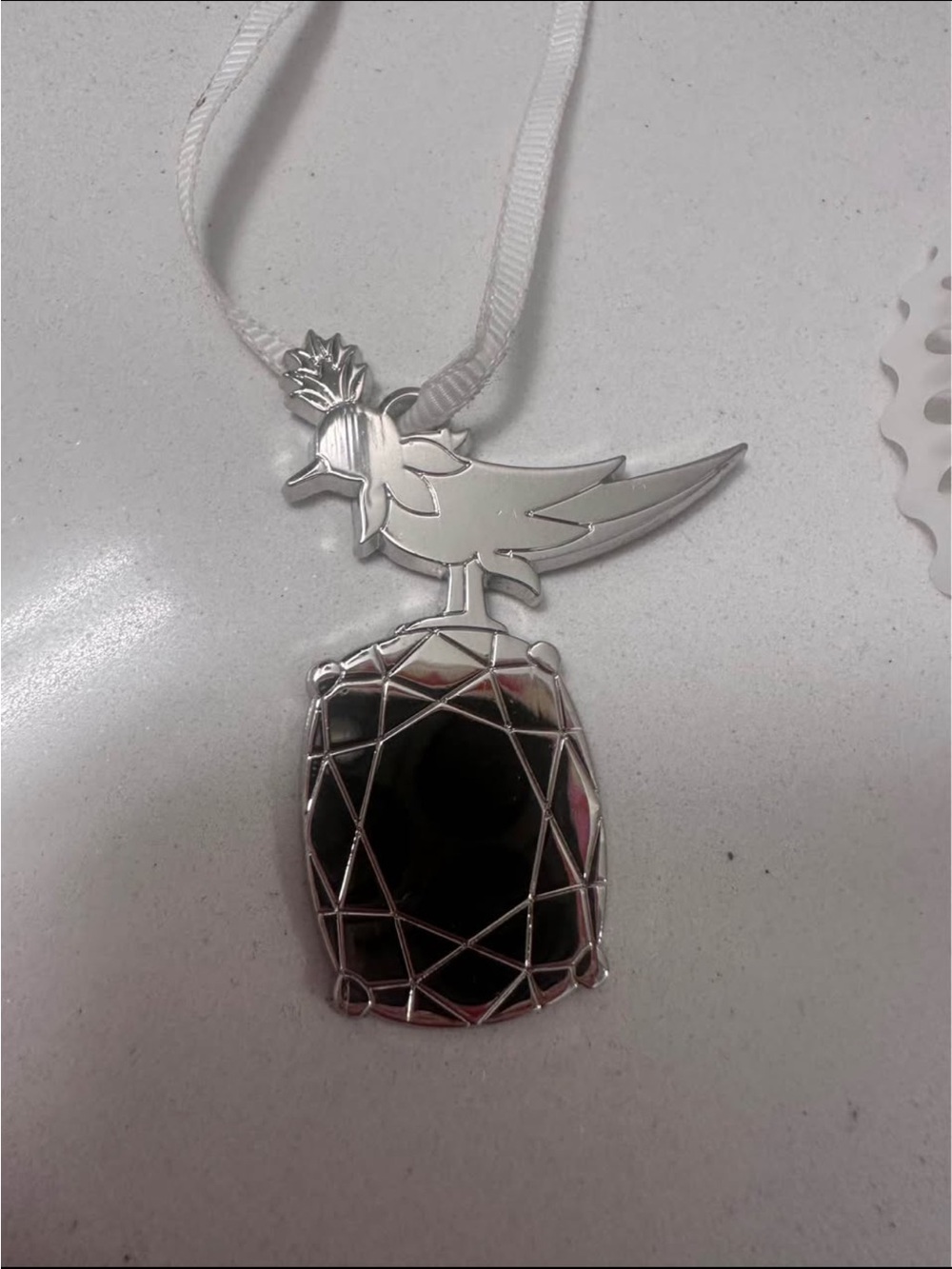 Tiffany & Co limited edition- bird on rock metal bag charm novelty - Picture 1 of 3